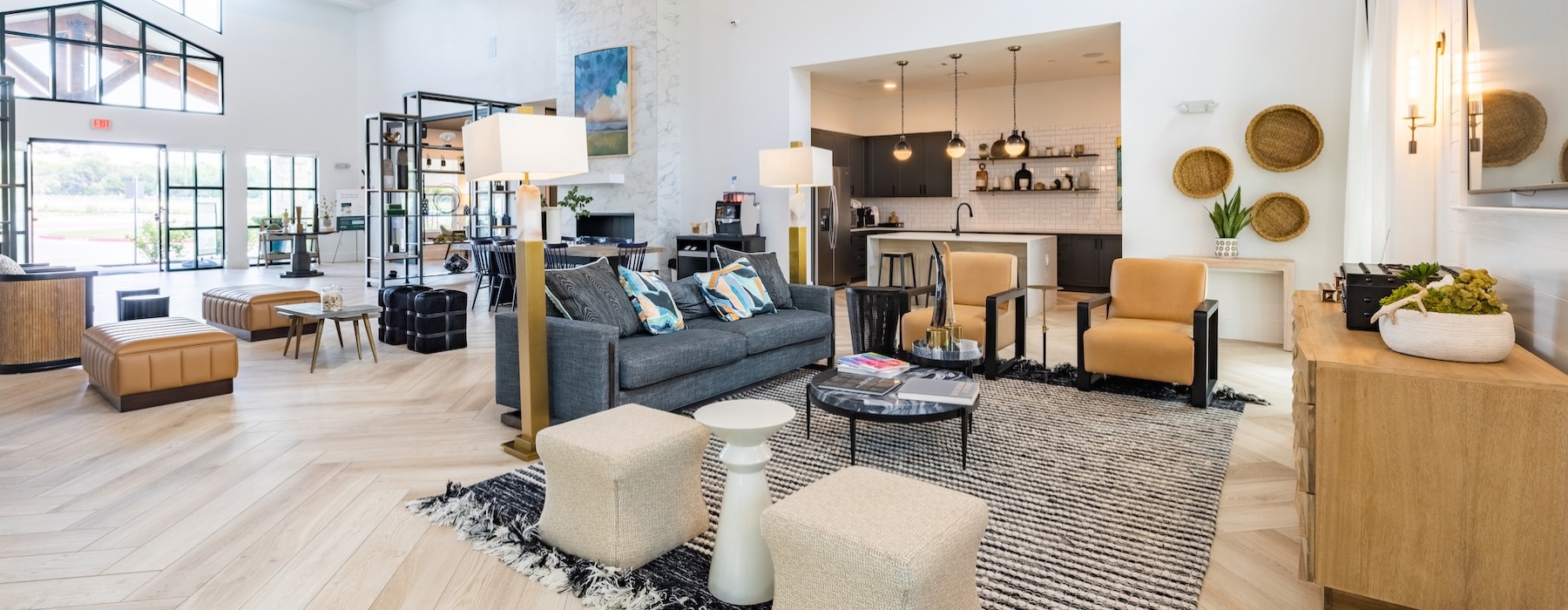 a clubroom with a couch and chairs