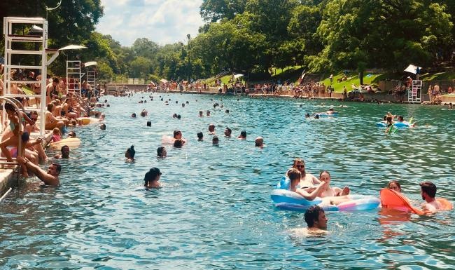 a group of people in a pool